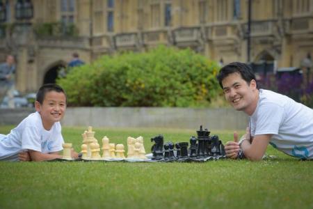 Kevin Pan hanging out with Grandmaster David Howell after Kevin defeated the GM in a simul!